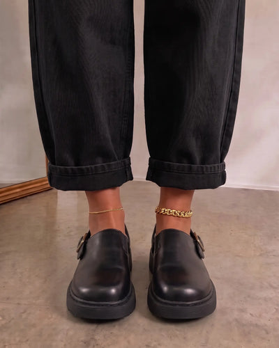 Mule negro Buckle Urban Luxe